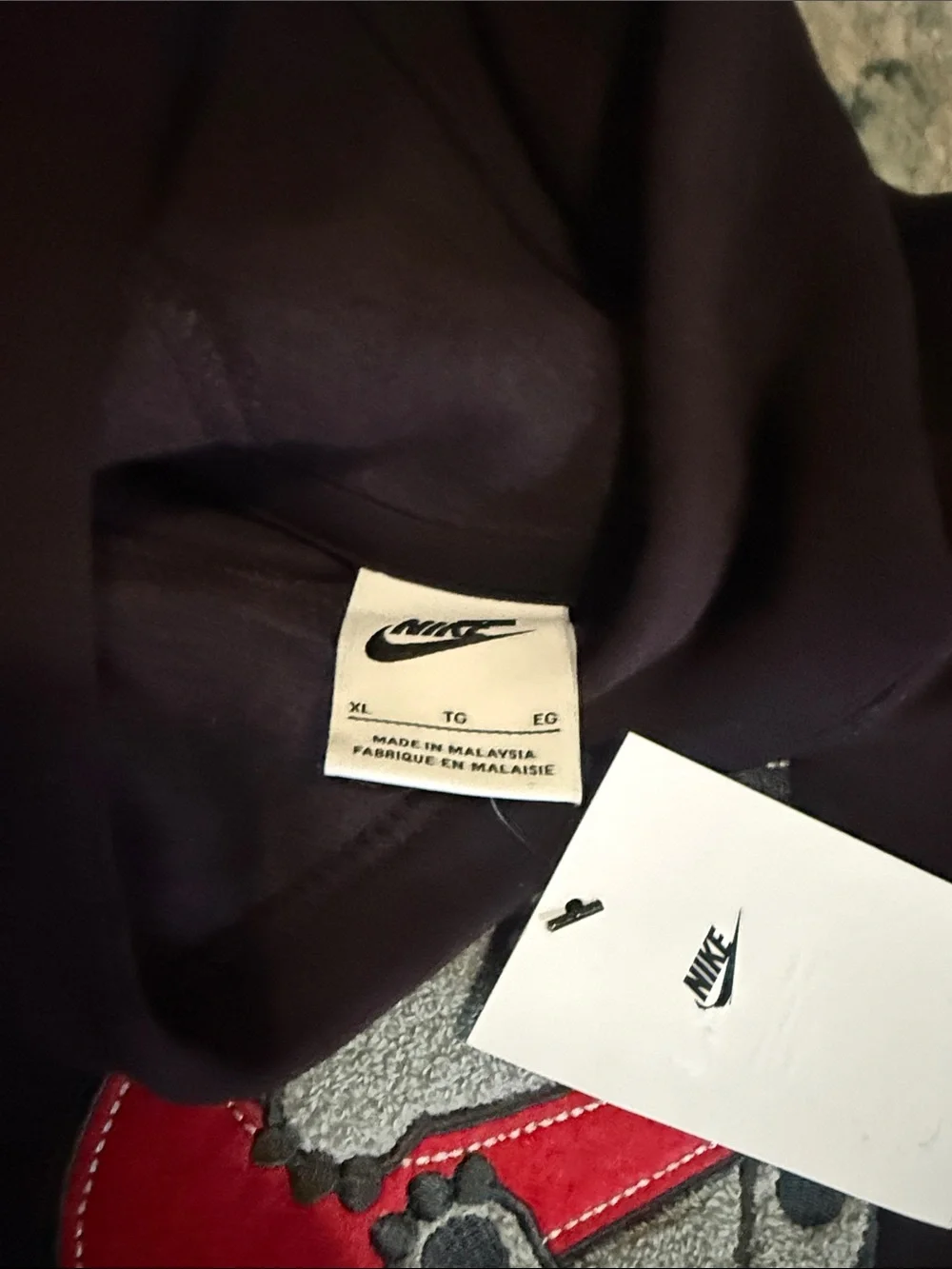 Nike Hoodie with Red Graphic Swoosh
